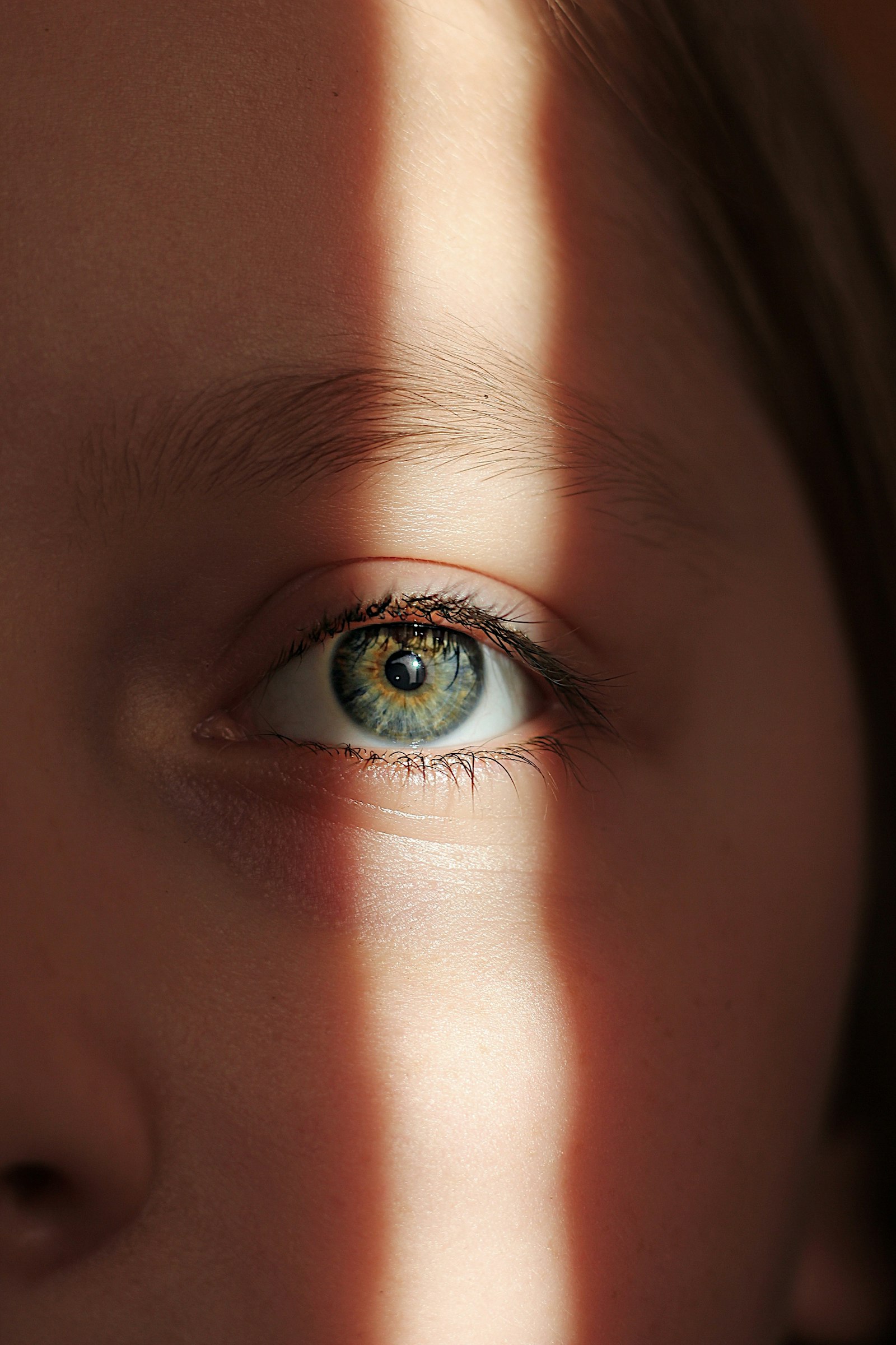 Close-up of a human eye, representing a contact lens fitting