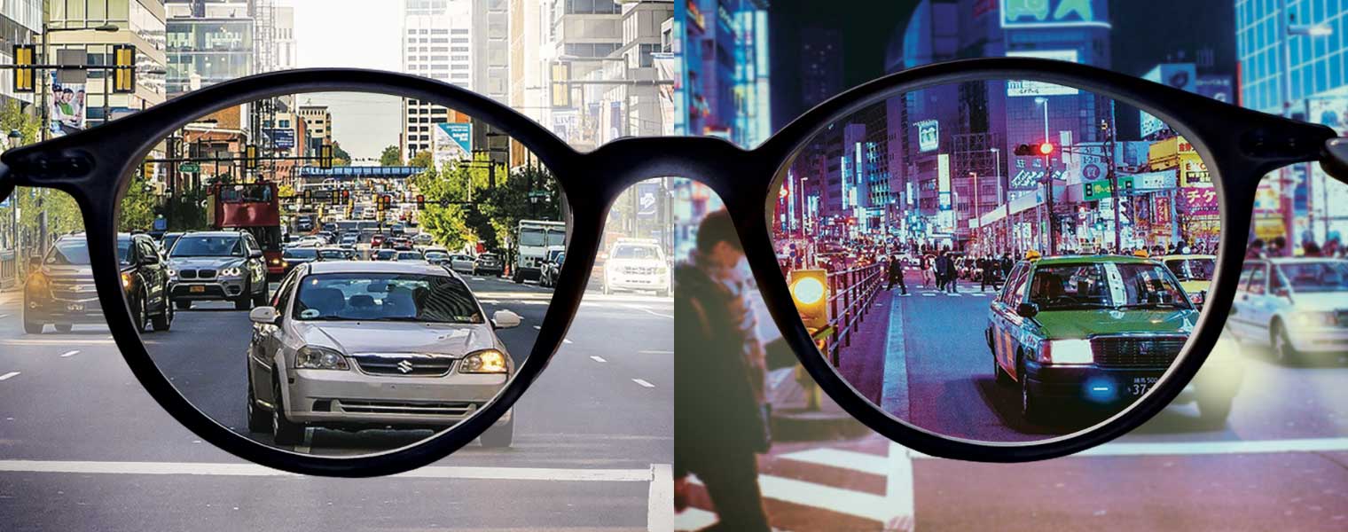Split image through eyeglass lenses showing day and night driving scenes, representing an anti-reflective coating built for night driving