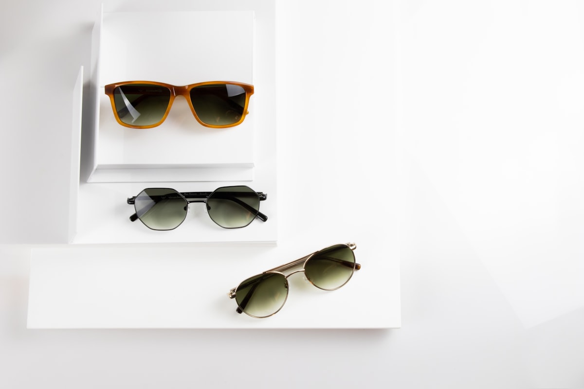 Designer eyeglass frames on display, representing service for Pickering patients
