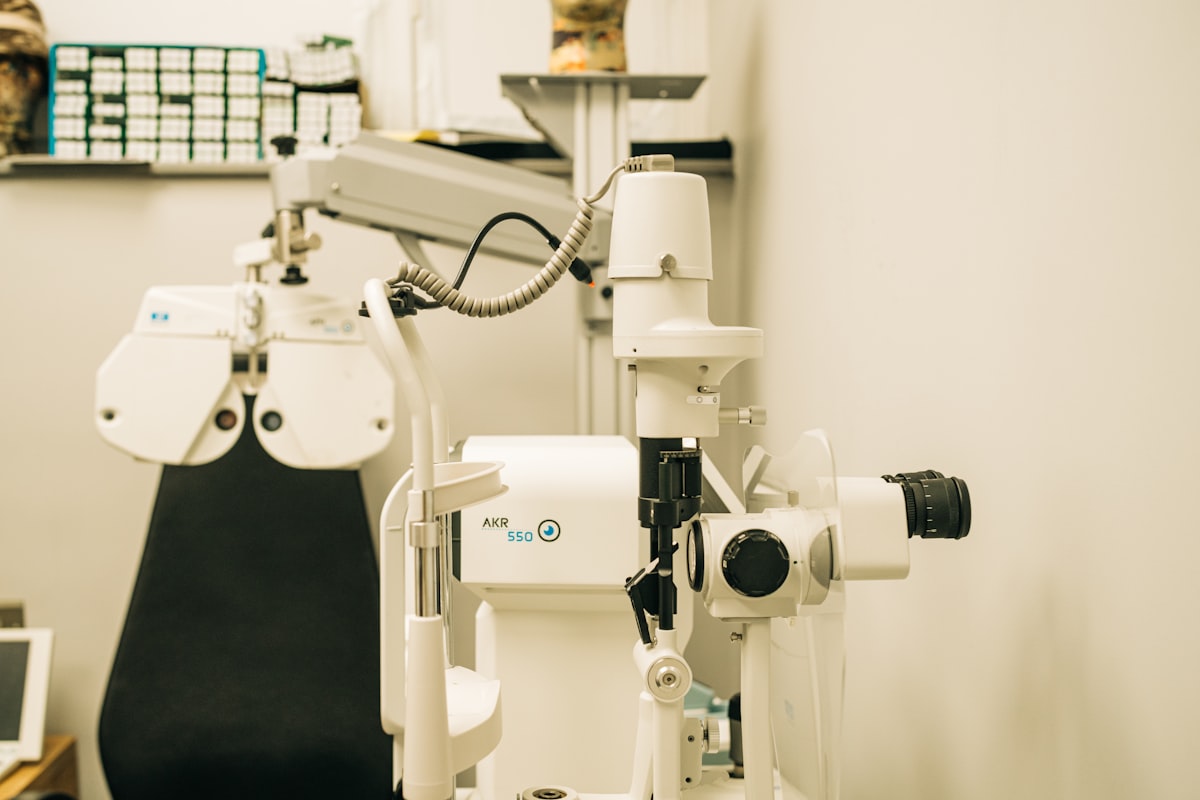 Modern optometry examination equipment in a bright clinic room